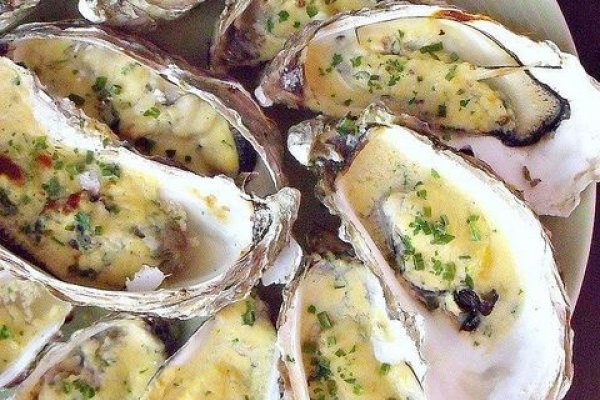 Stridii gratinate cu sos de sampanie