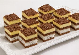 Prajitura cu cocos, crema de vanilie si blat pufos de cacao - reteta simpla, cu un rezultat grozav
