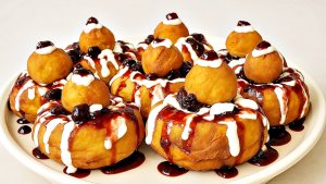 Papanasi pufosi cu branza de vaci – reteta simpla si delicioasa de papanasi prajiti