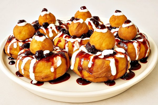 Papanasi pufosi cu branza de vaci – reteta simpla si delicioasa de papanasi prajiti